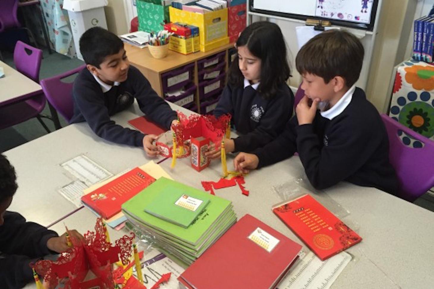 A group working on assembling the lantern